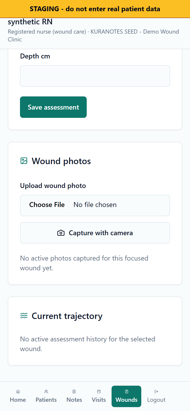 KuraNotes staging /wounds on a 390-pixel phone viewport: wound photo upload and capture-with-camera controls above the mobile tab bar. Synthetic clinic data, no real patient records.